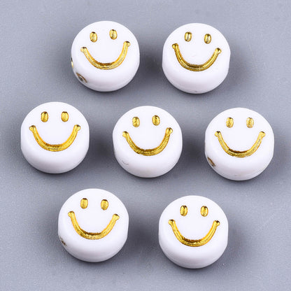 Smiley face gold plastic (100pzsaprox)