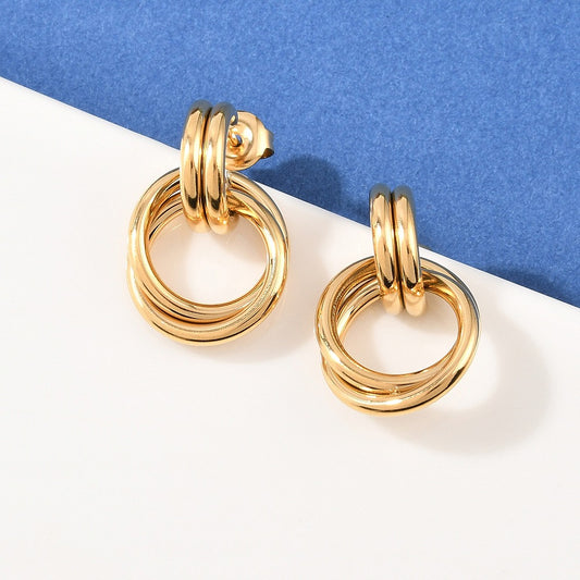 Arete de botón con Aro Giratorio