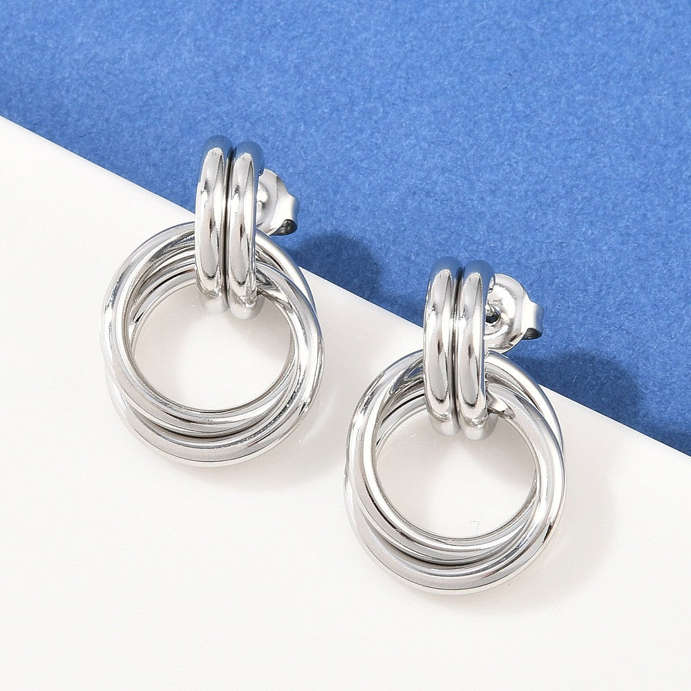 Arete de botón con Aro Giratorio